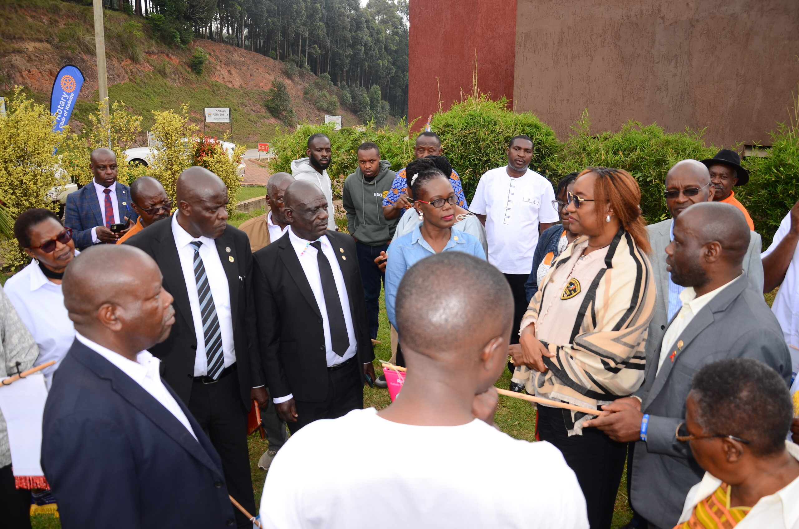 Members of Rotary Club of Lake Bunyonyi sharing a light moment during a weekly fellowship at Kwanzi Bistro in Kabale, Uganda
